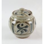 URSULA MOMMENS (1908-2010), a stoneware preserve pot and cover, decorated with stylised flower