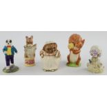 Eight Beswick porcelain figures comprising ; Rupert Bear and Algy Pup Go-Karting,