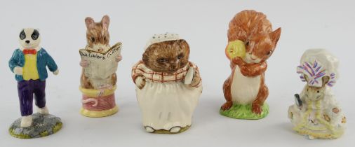 Eight Beswick porcelain figures comprising ; Rupert Bear and Algy Pup Go-Karting,