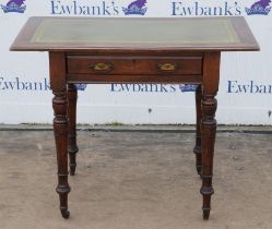 An Edwardian mahogany writing table, with moulded green inset top above one long drawer,