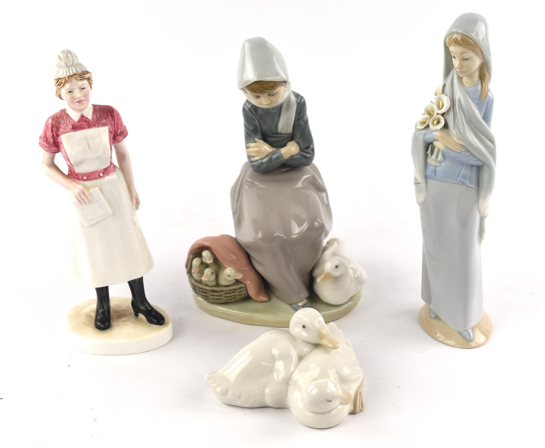Seven Lladro porcelain figures of girls, in various attitudes, some with geese, lambs and flowers,