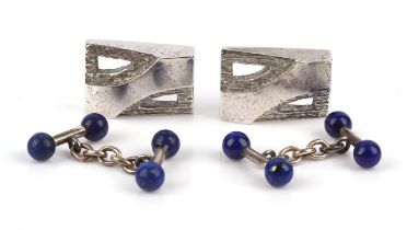 Two pairs of silver cufflinks one with la[is lazuli ball ends