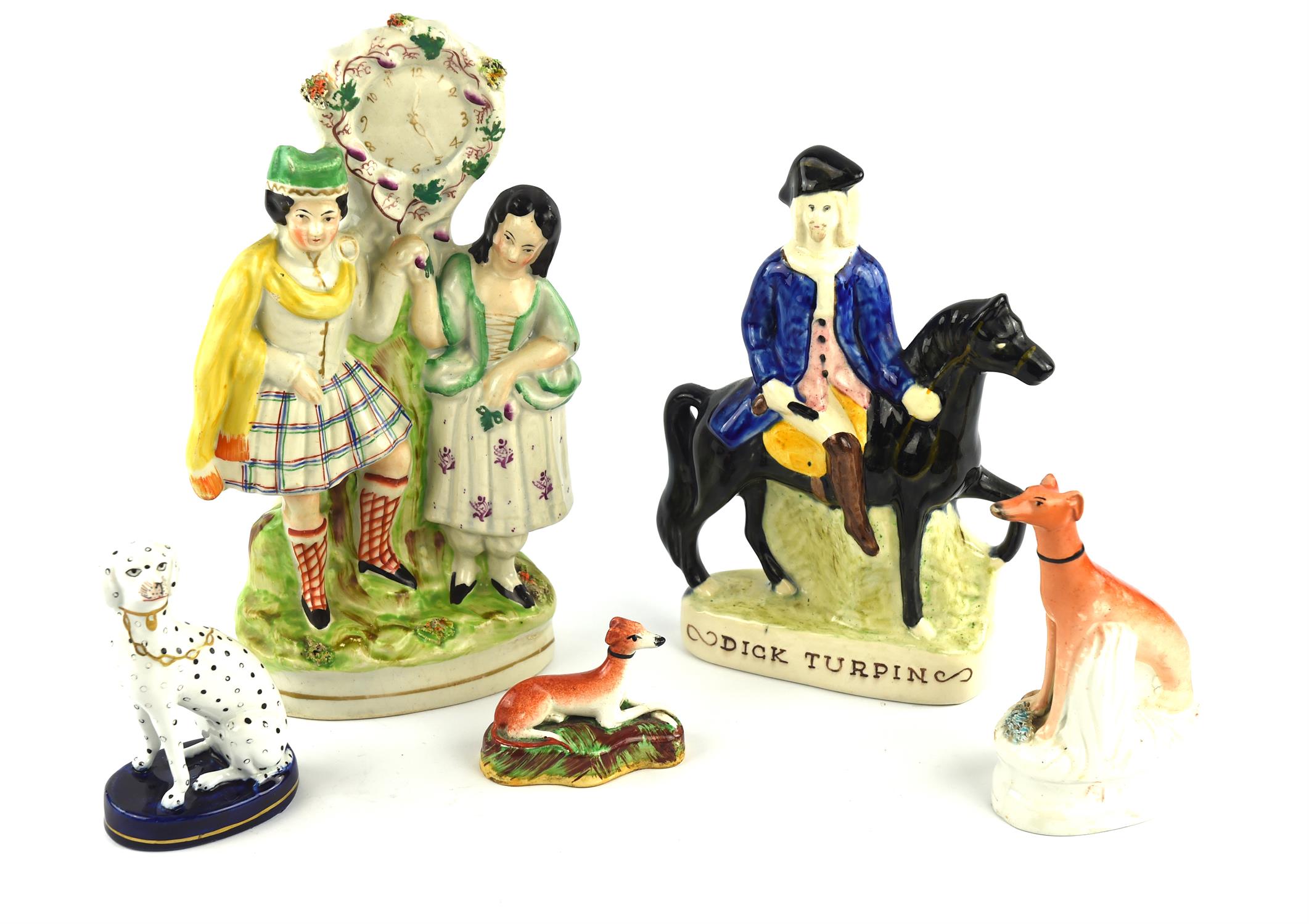 A collection of mainly late 19th and early 20th century Staffordshire flatback figures including ;