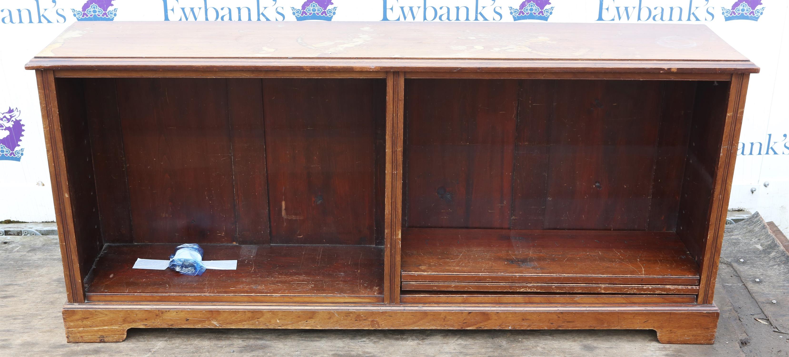 Mahogany low bookcase, late 19th century, with two adjustable shelves, on plinth base,