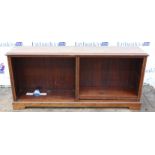 Mahogany low bookcase, late 19th century, with two adjustable shelves, on plinth base,