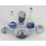 A group of Royal Copenhagen porcelain wares comprising ; two decanters and stoppers detailed with