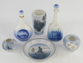 A group of Royal Copenhagen porcelain wares comprising ; two decanters and stoppers detailed with