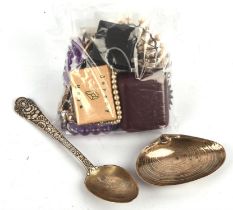 Group of mostly silver jewellery and miscellaneous items including a decorative dessert spoon