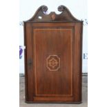 A George and later mahogany hanging corner cupboard, H 92cm, W 55cm, D 26cm