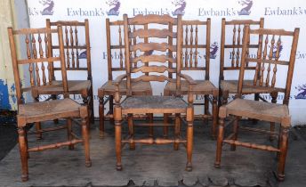 A set of six oak George IV style spindle back chairs, with rush seats, H 100cm, together with a