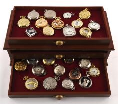 Two wooden display cases containing 81 quartz pocket watches, in base metal. (81)