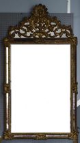 A 19th century style gilt composite rectangular wall mirror with a foliate scroll crest.