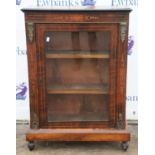 A late Victorian walnut and inlaid pier cabinet, with gilt metal mounts, two shelves and bun feet,