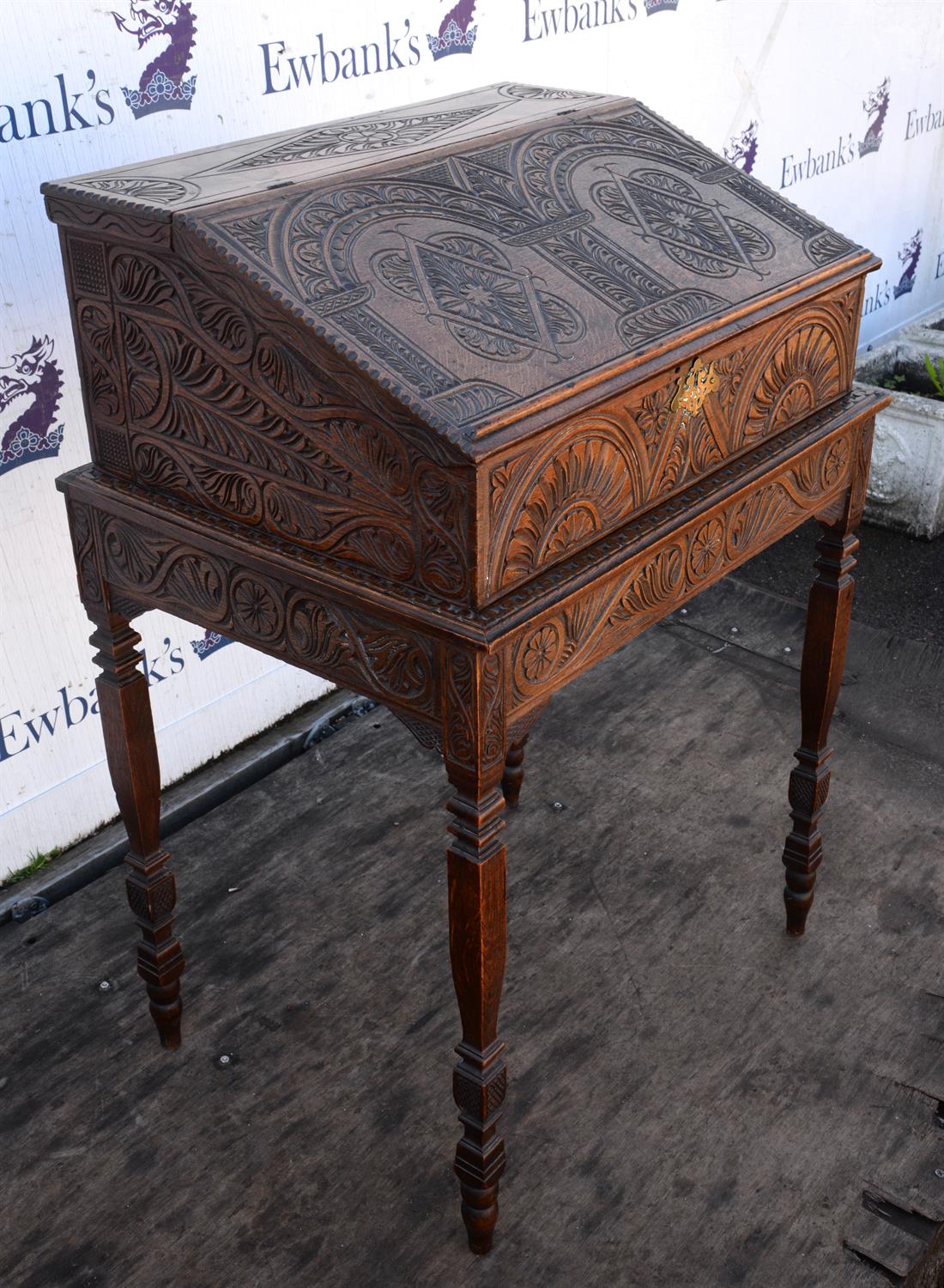 A George III oak desk box, later carved with lozenges and lunettes, interior with drawers, - Image 3 of 4