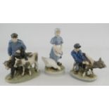 Three Royal Copenhagen figure groups. One depicting a farmer and two cows, No 1858,