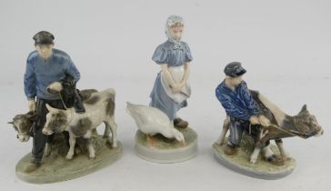 Three Royal Copenhagen figure groups. One depicting a farmer and two cows, No 1858,