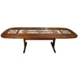 Ansager Mobler, a teak extending dining table, inset with pottery tiles decorated with Celtic/Norse