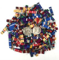 Large qty of military ribbons and other pieces