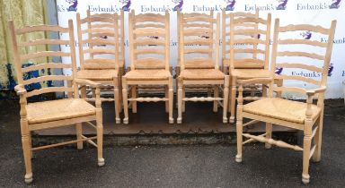 A set of ten George IV style limed oak ladderback chairs, late 20th century, to include a pair of