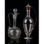 Martin Pugh for Mappin and Webb, a silver mounted claret jug, signed to the interior lid,