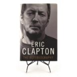 Eric Clapton The Autobiography - Signed copy from 2008. Signed inside in gold pen.