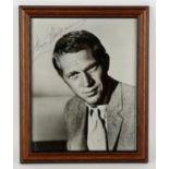 Steve McQueen Framed and Glazed Autograph, on a b/w photo c’ 1960’s, sold with provenance from