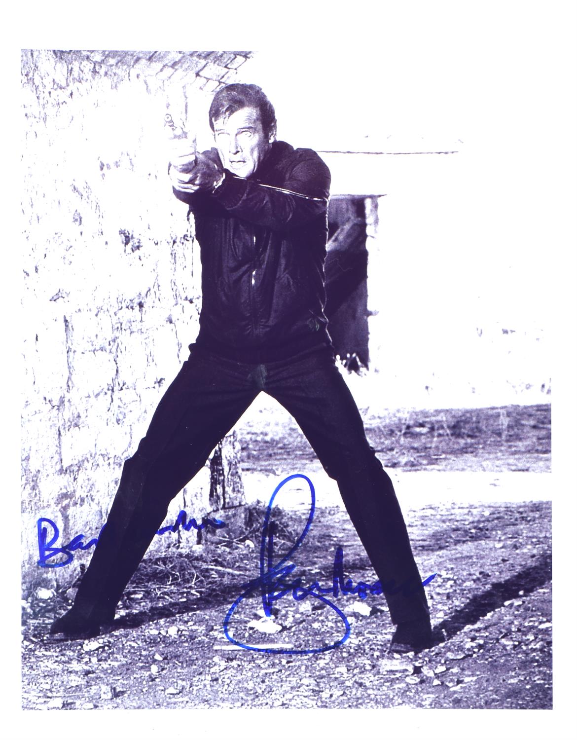 James Bond: Roger Moore, Autographed black and white publicity photograph, Signed in blue pen,