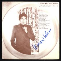 Signed Leonard Cohen Greatest Hits Vinyl LP on CBS label. Signed to front in blue pen.