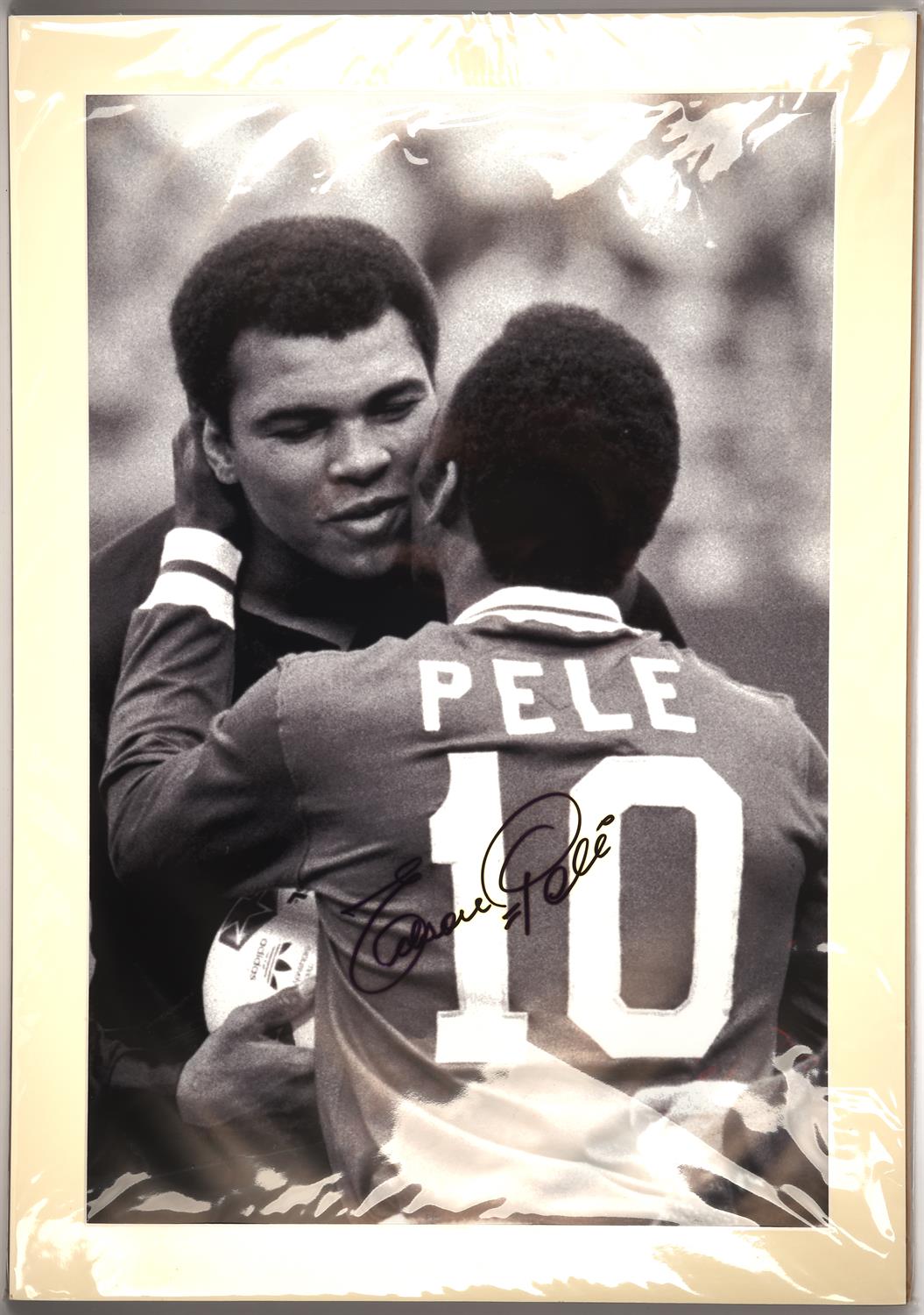 Pele - signed photo showing him with Muhammad Ali, with A1 Sporting Memorabilia COA,