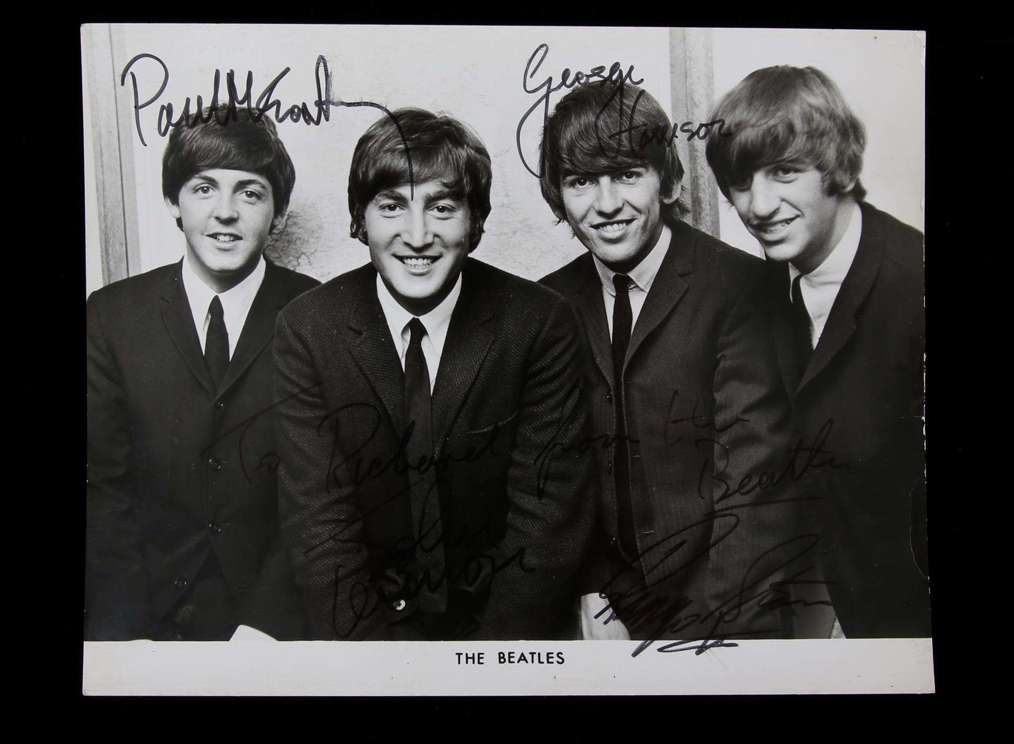 The Beatles - Autographed black and white photograph, Signed by all four and dedicated to Richard,