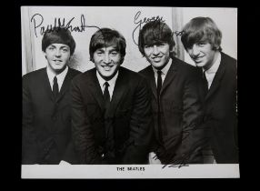 The Beatles - Autographed black and white photograph, Signed by all four and dedicated to Richard,