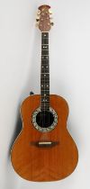 An Ovation 1617 Legend bowl back electro-acoustic guitar made in USA and hard case.