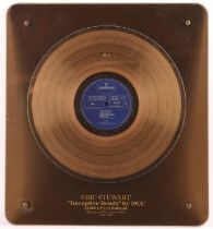 10cc Gold Disc Awarded to Eric Stewart for sales of 25,000 copies of 10cc album 'Deceptive Bends'