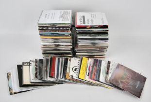Promo CD collection - a quantity of mixed genres mostly from the 2000s -2010s. Artists such as