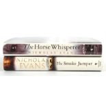 EVANS (Nicholas). Two Autographed first edition hardback books – The Horse Whisperer and The Smoke