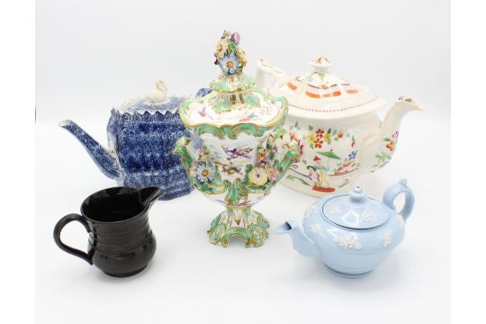 A quantity of mainly 19th century pottery tea wares including ; a Rockingham style twin handled