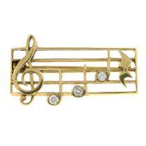 9ct gold diamond music brooch, depicting 'DEAREST'