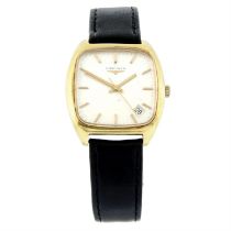 Longines - a wrist watch, 34mm.