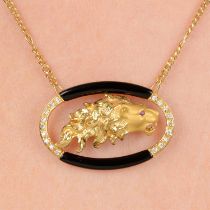 Diamond & onyx lion necklace, by Carrera y Carrera
