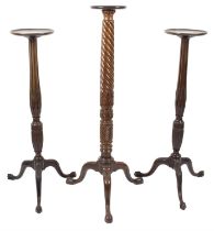 Three 19th century mahogany torchere