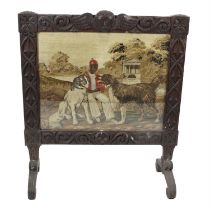 19th century oak framed firescreen with Berlin woolwork panel