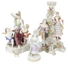 A Meissen Lady Card player and two continental figures