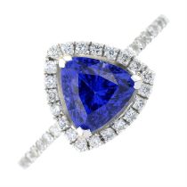 Synthetic sapphire and diamond dress ring
