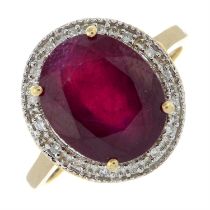 Glass-filled ruby and diamond cluster ring