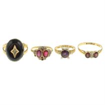 Four gem-set rings