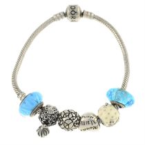 Bracelet with six charms by Pandora