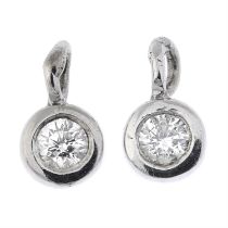 Two diamond pendants