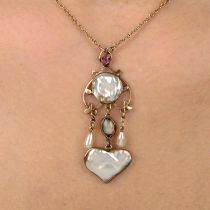 Arts & Crafts gold gem pendant, on chain