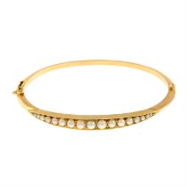 Early 20th century gold split pearl bangle