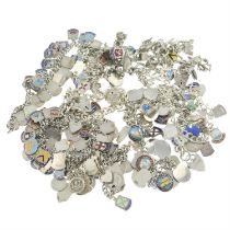Ten charm bracelets, mostly with enamel charms